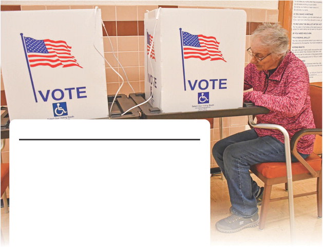 (Pictured) The Nov. 3 election is approaching and absentee voting is underway at Day County Courthouse, where local voter Diane Huggett cast her ballot Oct. 22. Reporter &amp; Farmer | Timothy Gibson