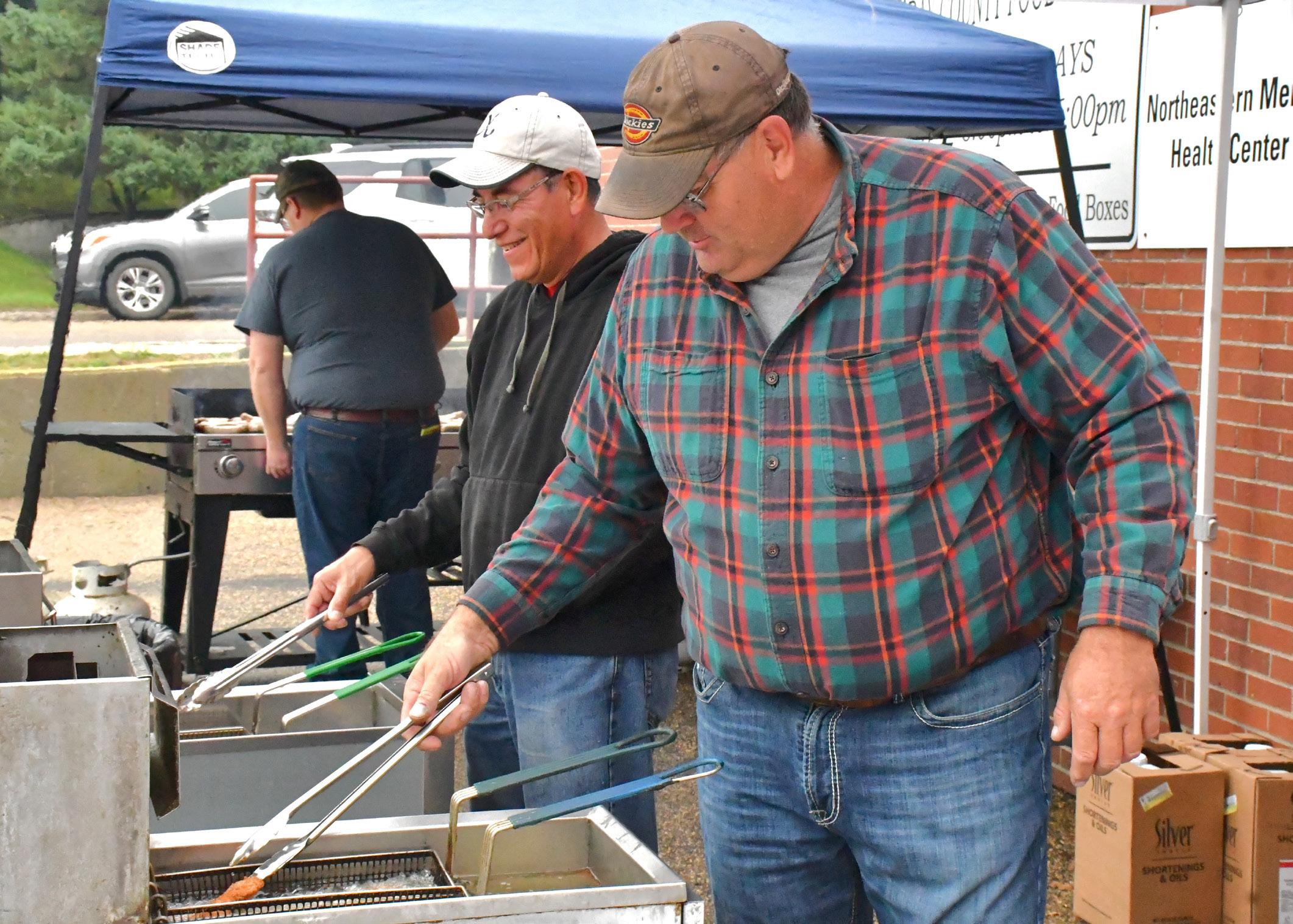 A German dinner was provided for attending community members at the annual German Fest Sept. 26. From left, Alfredo Garduno and Nathan Fischer help fry the schnitzel for the meal. Reporter &amp; Farmer | Connor Handrahan