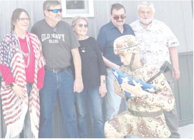 Patti Mitchell, left, presented retired U.S. service veterans with VFW “Thank You for Serving” coins. Pictured with Mitchell, from left are David Fromelt, Jane (Fromelt) Geidt, John Fromelt and Stanley Roberts, husband of Nancy Fromelt. Coins are sponsored by VFW Auxiliary 628. Reporter &amp;amp; Farmer | Subscriber snapshot