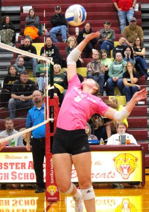 Webster Area setter Chloe Mammenga bumps a short shot over the net for a point against Northwestern Oct. 1 Reporter &amp; Farmer | Timothy Gibson
