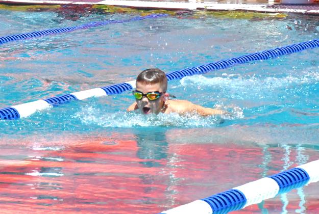 Hunter Nelson competes in the 25 fly event during the Webster High Point Swim Meet July 11. Nelson was able to get first in the event with a time of 31.22. Reporter &amp; Farmer | Connor Handrahan