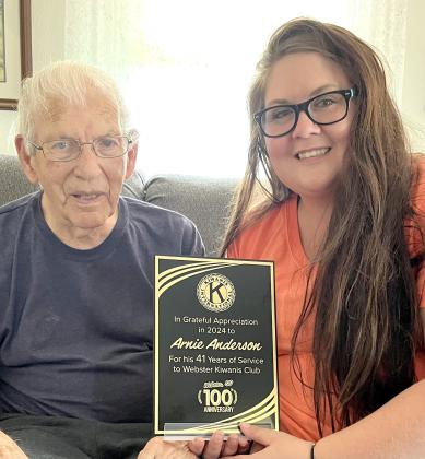 Webster Kiwanis president Teresa Lone, right presented a plaque to Arnie Anderson in appreciation of 41 years of service to the Webster organization. The recognition was part of Webster Kiwanis Club’s 100th anniversary celebration. Reporter &amp;amp; Farmer | Subscriber snapshot