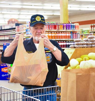 Vice president of Vietnam Veterans of America Chapter 1054 Jim Hanson packs Thanksgiving meals Nov. 24 at Mike’s Jack &amp;amp; Jill in Webster to give away to Day County veterans in need. Chapter 1054 provides the service to nine counties in northeast South Dakota and gave away all 50 of their meals on the day. Reporter &amp;amp; Farmer | Leyton Beardslee