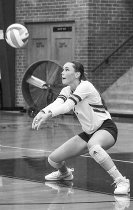 Jayden Lorensberg (1) of Webster Area receives a hit during the Bearcats 0-3 match loss against Warner Monarchs at Webster Armory Sept. 2. Reporter &amp;amp; Farmer | Leyton Beardslee