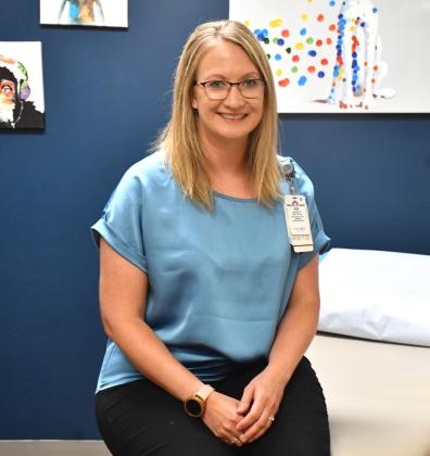 Ashley Ewing, newly appointed CEO of Webster’s Sanford Health location, sits in an exam room at the hospital July 9. Ewing served as director of nursing for 11 years before taking the role of CEO. Reporter &amp;amp; Farmer | Leyton Beardslee