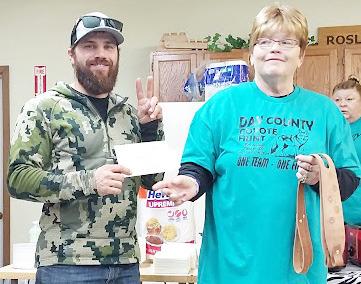 The 18th annual coyote hunt took place Dec. 13-15 in Roslyn. As the event unfolded 74 total coyotes were harvested with 24 teams participating. Here, second place winner Cody Scarrott, left, receieves his $500 check from event organizer Patti Mitchell. In addition to his monetary winnings, Scarrott was also awarded two leather gun slings. Reporter &amp;amp; Farmer | Subscriber Snapshot