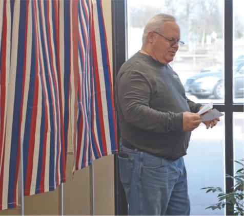 Mike Wiley of Webster exits the voter booths at Webster Area High School office April 8 after casting his ballot in the Webster Area School District board member race. Seven candidates were vying for two open seats on the board. Wiley was among a reported 19 percent voter turnout of 518 individuals. There are 2,676 registered voters in the school’s district. Reporter &amp;amp; Farmer \\ Amanda Dulitz