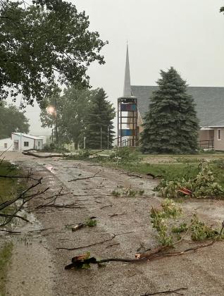Fallen tree branches littered the road near Zion Lutheran Church in Andover June 29, when a tornado touched down near the town. Reporter &amp;amp; Farmer | Subscriber Snapshot