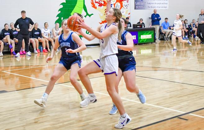 Liza Purdy (5) of Waubay/Summit goes up for a layup during the Mustang’s 58-27 win over Leola/Frederick Titans Feb. 24 in Waubay. Purdy finished the game with two points, three rebounds and five assists. Reporter &amp;amp; Farmer | Connor Handrahan