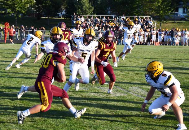 Webster Area running back Tate Mammenga braces for contact with a Groton Area Tiger during the homecoming contest Sept. 6, which resulted in a 7-14 loss for the Bearcats. Reporter &amp;amp; Farmer | Brenner Cariveau