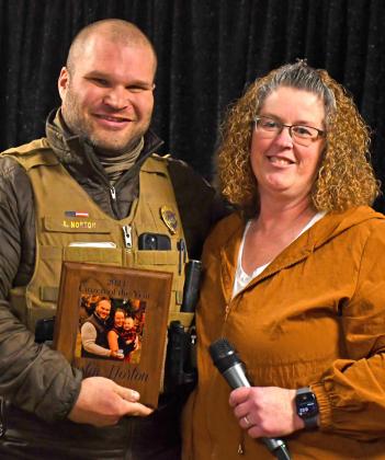 Austin Norton was awarded the Webster Area Chamber of Commerce Citizen of the Year at the Chamber’s annual meeting Jan. 20. Presenting the award was last year’s citizen of the year Amy Fischer. Reporter &amp;amp; Farmer | Amanda Dulitz