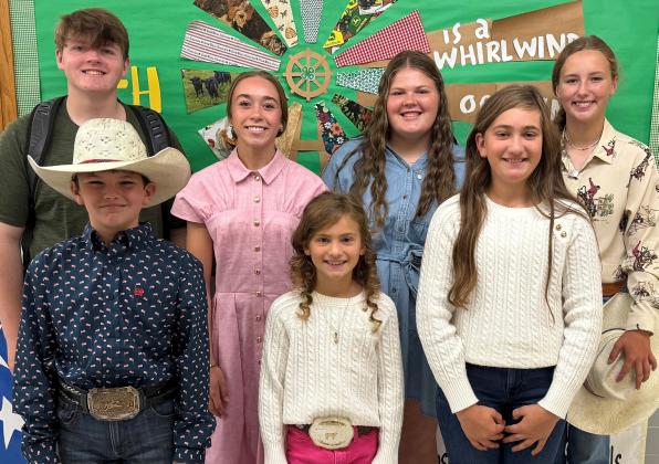 Day County 4-H Fashion Revue award recipients pose for a picture in the Day County Courthouse July 31. Back, from left, is Carson Fischer, senior reserve champion, Macee McGregor, senior grand champion, purple ribbon, Kelsey Fischer, senior purple ribbon and Carlee Wik, junior reserve champion. Front, from left, is Logan Wik, beginner purple ribbon, Ava Larson, beginner reserve champion, purple ribbon and Cora Larson, junior purple ribbon and purple ribbon. Reporter &amp;amp; Farmer | subscriber snapshot