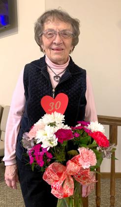 Lorinda Towe poses with the special bouquet of flowers she had made to celebrate surviving 30 years with a heart transplant. The Bristol woman received her new heart the day after Easter in 1994, enabling her to live a normal, active life in the community. Reporter &amp;amp; Farmer | Amanda Dulitz
