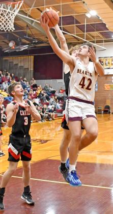 Webster Area Bearcat Jack Shoemaker goes up for a basket in a home game Jan. 9 against the Deuel Cardinals. The Cats fell 64-38. Reporter &amp;amp; Farmer | Robert Dulitz