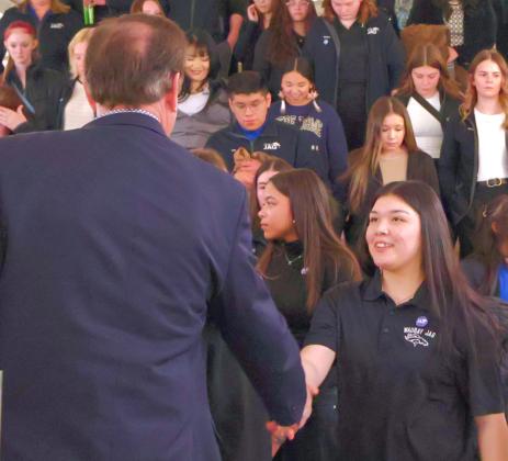 Waubay JAG student Yulisa De Loera shakes hands with Gov. Larry Rohden at the South Dakota legislative session Jan. 29. “She went from being very shy last year to shaking hands with the governor,” said JAG specialist Katie Thompson. Reporter &amp;amp; Farmer | Subscriber Snapshot