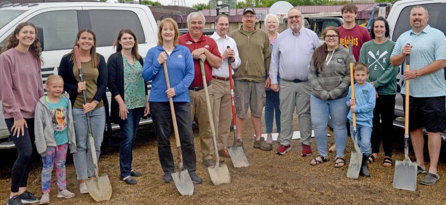 Donors, teachers and volunteers gathered for the groundbreaking for the new playground equipment at the Webster Area School playground June 18. Pictured from left are Emily Wagner, Lucy and Natalie Kuecker, Allegra Duerre, Lisa and Loren Schoenbeck, Kelly Hanson, Mike Ninke, Rita Johnson, Todd Garry, Teresa Lone, Jack, Alyssa and Huck Shoemaker and Craig Case. Reporter &amp;amp; Farmer | Annie Witt