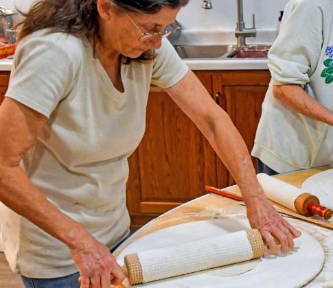 Terry Hagen rolls out lefse dough Nov. 21 during lefse fundraiser at Tabor Church, Webster. The dough must be thin enough so it can evenly cook on both sides, but sturdy enough to not fall apart. Reporter &amp;amp; Farmer | Connor Handrahan