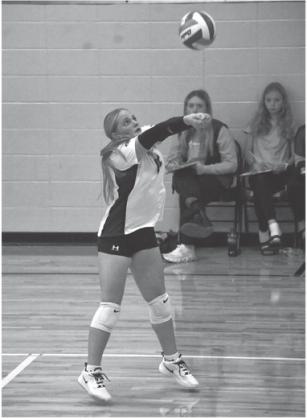 Gracia Althoff of Waubay/Summit receives the ball during the Mustang’s match against Britton-Hecia Oct. 7 in Waubay. Waubay/Summit lost the match 0-3 with set scores of 16-25, 23-25 and 21-25. Reporter &amp;amp; Farmer \\ Leyton Beardslee