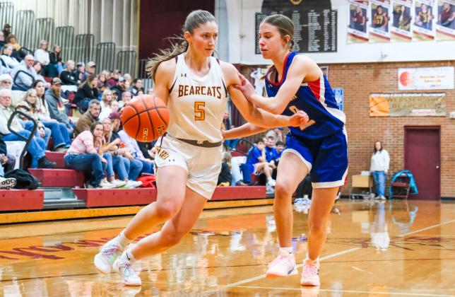 Chloe Mammenga (5) of Webster Area drives towards the basket during the Bearcats 47-61 loss to Warner Dec. 13 in Webster. Mammenga finished with 12 points to lead the team. Reporter &amp;amp; Farmer | Leyton Beardslee