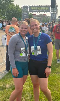 Reporter &amp;amp; Farmer | Leyton Beardslee (Above) Among the half marathon runners are from left Jenna Sinner, Madison Rausch, Jennifer Nelson and Missy Rausch. The 13.1 mile race took place May 31 in Fargo, ND and featured seven Webster women who all completed the race. (At right) Half marathon runners from left Mia Coester and Norah Zubke pose with their medals after completing the 13.1 mile race in Fargo, ND May 31. (Subscriber snapshot)