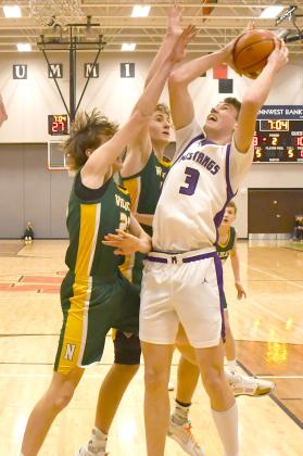 Mustangs boys faced Northwestern Wildcats March 7 in the first round match of the regional bracket. Waubay-Summit won the contest with a 51-43 score. Here, Hogan Hlavacek (3) attempts to shoot the ball amid a cluster of Northwestern defenders. Reporter &amp;amp; Farmer | Brenner Cariveau
