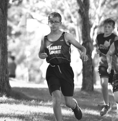 Carsyn Grebner of Waubay/Summit cross country runs the junior varsity 3k race at the Webster Area Invite on the Webster golf course Sept. 15. Grebner finished in 19th with a time of 17:04.54. Reporter &amp;amp; Farmer | Leyton Beardslee