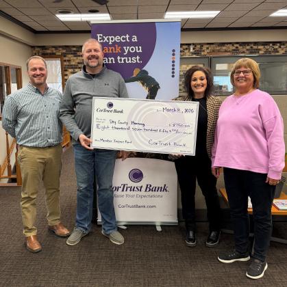 Day County Housing was awarded an $8,750 grant from CorTrust Bank, in partnership with Federal Home Loan Bank of Des Moines (FHLB Des Moines) as part of their matching grant program called the Member Impact Fund. Pictured March 31 at CorTrust Bank in Webster are, from left, Day County Housing board members Morgan Dorsett, Derek Sinner; Webster CorTrust Bank manager Lana Holland and Day County Housing board member Peggy Ninke. Reporter &amp;amp; Farmer | Subscriber snapshot