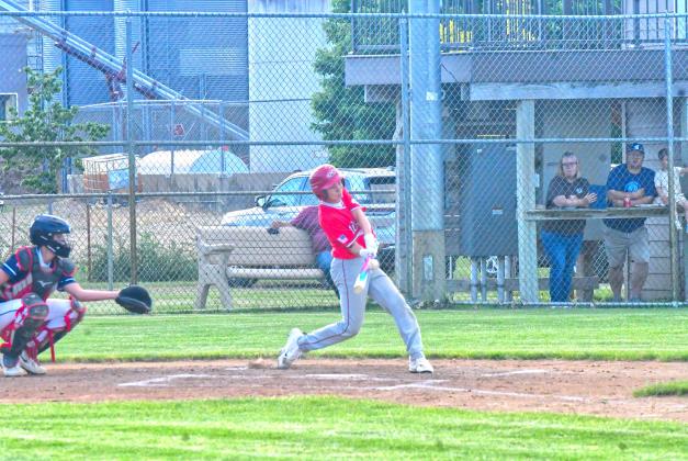 Bennett Kuecker hits a single during Webster Teeners’ first game against Lake Norden June 5. Kuecker was one of 11 runs to be scored in the first inning, which eventually led to a 16-6 victory. Reporter &amp; Farmer | Connor Handrahan