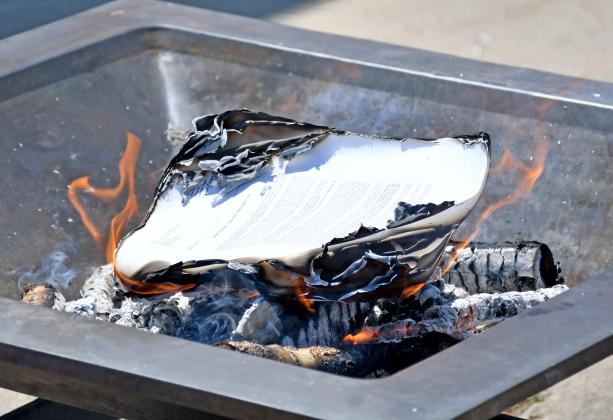 The official mortgage paperwork for Tabor Lutheran Church in Webster was tossed onto the open flames July 14 in a ceremony, symbolizing the last of the congregation’s indebtedness being paid off 15 and a half years earlier than expected. Reporter &amp;amp; Farmer | Amanda Dulitz