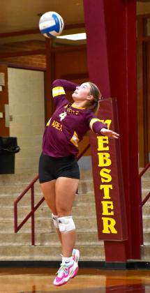 Jersey Johnson serves the ball for Webster Area varsity volleyball during their 3-0 match win over Wilmot Sept. 23. at Webster Armory. Set scores for the match were 25-8, 25-13 and 25-10. Reporter &amp;amp; Farmer | Leyton Beardslee
