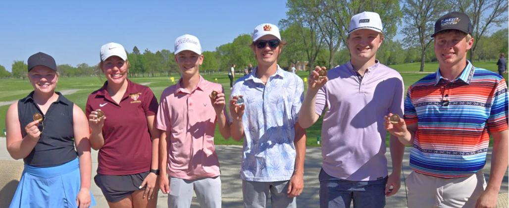 Left to right, Mia Coester, Bailee Ninke, Seth Lesnar, Blaize Amdahl, Thomas Kuecker and Michael Dorsett hold up their medals from a successful day at Pre-Region and ECC combined golf tournament in Watertown May 12. Reporter &amp;amp; Farmer | Subscriber snapshot