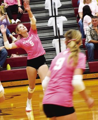 Webster Area Bearcats hosted Aberdeen Christian Knights Oct. 21 at the Webster Armory. Here, Madison Block (5) gears up to spike the ball while her teammate Abby Vander Linden (9) watches closely. The Bearcats lost in 5 sets. Reporter &amp;amp; Farmer | Brenner Cariveau