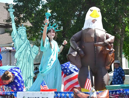 The annual parade at Waubay Fun Fest was another huge celebration for the community. Dozens of floats were driven down Main Street and candy filled the streets. Here, Brittany Hanna dressed up as the Statue of Liberty and Ryan Hanna showed off his American spirit by dressing up as an eagle. Pictures by Reporter &amp; Farmer |Connor Handrahan