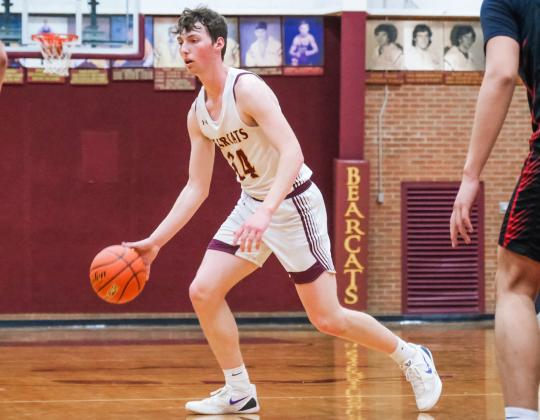 Gage Wik (24) of Webster Area looks for an opening during the Bearcats 59-48 victory against Sisseton Redmen Feb. 9 in Webster. Bearcats move to a record of 9-7 on the season. Reporter &amp;amp; Farmer | Leyton Beardslee