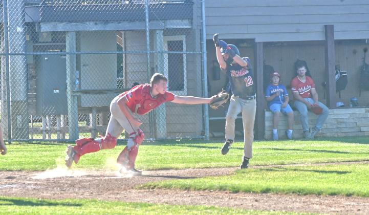A round robin tournament was held in Webster July 11 and Teeners played three games over the course of a single day. Here, catcher Bensen Huggett can be seen tagging a runner who tried to make it home after a ground ball was hit. Reporter &amp; Farmer | Connor Handrahan