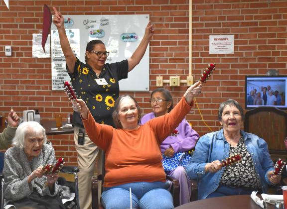 Bethesda Home was moving and grooving Oct. 21 for a musical activity where residents use noisemakers to turn simple rhythms and melodies into a low-impact workout. Front row, from left: Zona Hairgrove, Pam Schumack and Marilyn Stern. Back row: staff member Amanda Sullivan and resident Georgette Sullivan. Reporter &amp; Farmer | Timothy Gibson