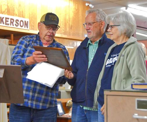 At the grand opening of the Museum of Wildlife, Science &amp;amp; Industry June 13, Jim Brakefield announced the new library named after Monte and Fran Rougemont. From left, Brakefield can be seen surprising Rougemonts with the announcement of the new expansion. Reporter &amp;amp; Farmer | Connor Handrahan