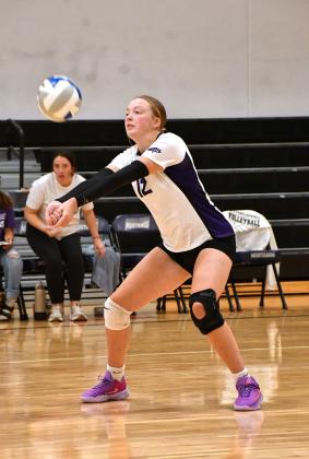 Mackenzie Zubke receives the ball during Waubay/Summit’s 2-3 match loss against Milbank Sept. 16 in Summit. Set scores for the match were 23-25, 25-15, 25-13, 25-27 and 5-15. Reporter &amp;amp; Farmer | Leyton Beardslee