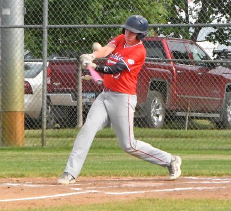 Webster Post 40 Bensen Huggett gets a hit during the fourth inning and secures a single during Post 40’s game against Sisseton June 25. Reporter &amp; Farmer | Connor Handrahan