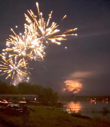 Independence Day fireworks popped and sparkled over the water of Breske Bay, Waubay Lake. In the distance, lightning lit the sky, creating a unique show for America’s 250th anniversary. Reporter &amp;amp; Farmer | Timothy Gibson