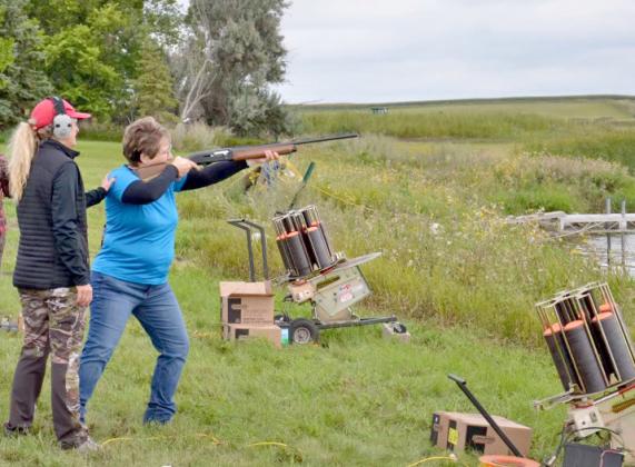 Tina Dokken steadies Shannon Garduno’s shoulder during a target practice session at last year’s event to learn how to pheasant hunt at Lynn Lake. Reporter &amp;amp; Farmer | Subscriber snapshot