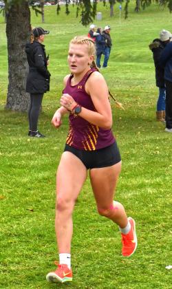 Webster Area Bearcats hosted the annual South Dakota High School Activities Association Regoin 1 A Cross Country Meet Oct. 14. Multiple Bearcat runners received personal bests and Bearcats qualifed two runners for the state meet. Above ,Hannah Sonstebo runs her personal best time of 21:09.4 for 11th and qualifed for state. Reporter &amp; Farmer | Connor Handrahan
