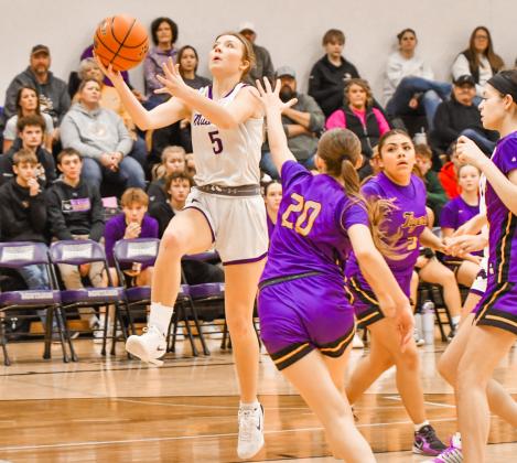 Liza Purdy of Waubay/Summit attempts a layup during the Mustangs 60-21 win over Tri-State Tigers Dec. 30 in Summit. Purdy finished with 12 points in the game. Reporter &amp;amp; Farmer | Leyton Beardslee