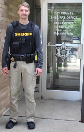 Sheriff Deputy Kolby Weinberg stands in front of the Day County Sheriff’s Office. Weinberg graduated from Lake Area Technical College with an associate degree in law enforcement. Reporter &amp; Farmer | Annie Witt