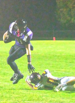 Waubay/Summit Mustangs faced off against Webster Area Bearcats for their final regular season game Oct. 16. Mustangs took home another win, making their record 7-1 for the regular season. Mustangs running back Krew Gaikowski pushed passed Bearcats defender Bennett Kuecker to get a first down. Reporter &amp; Farmer | Connor Handrahan