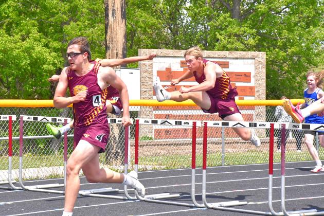 Jeron McCreary and Gage Baumgarn participate in the 110m hurdles at the Webster Invitational May 21. McCreary placed first with a time of 15.74 and Baumgarn placed second with a time of 17.05. Reporter &amp;amp; Farmer | Connor Handrahan