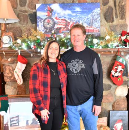 Pereboom’s Cafe will be recognized with a community service award for the first time on behalf of the South Dakota Retailers Association in Pierre Jan. 13. Here, owners Janice and Jay Pereboom stand together in front of Christmas decor at the cafe. Reporter &amp;amp; Farmer | Brenner Cariveau