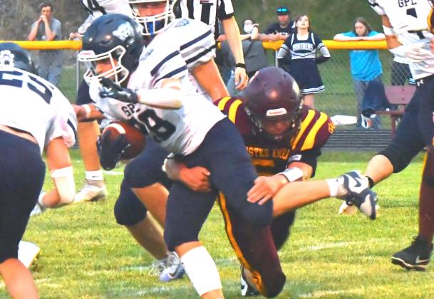 Webster Area Bearcats played their first home game and took a tough loss against Great Plains Lutheran 0-34, Aug. 28. Here, Bearcats player Gage Baumgarn tackles Great Plains Lutheran player Grady Hermoe. Reporter &amp; Farmer | Connor Handrahan