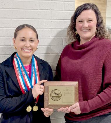 Webster Area High School student Jocelyn Rumpca, left received superior in serious and superior with distinction in humor awards at State Oral Interp competition in Watertown. Chelsea Larson, right, is coach of the school’s oral interp team which earned a state team excellence award. Reporter &amp;amp; Farmer | Subscriber snapshot