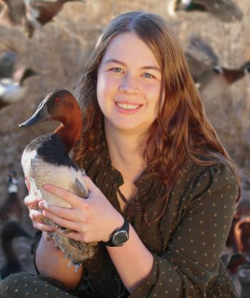Madison Grimm founder of Second Chance Flight holds up a Redhead duck. Grimm’s nonprofit is one of two duck egg salvage programs in the U.S. working to rescue and rehabilitate ducklings and eggs which have had their nests destroyed by agricultural activity. Reporter &amp;amp; Farmer | Subscriber snapshot